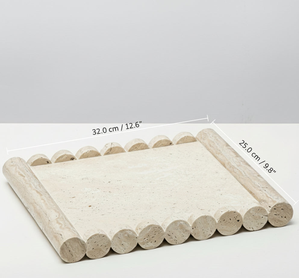 Dimension guide for the scalloped travertine tray showing 32cm width and 25cm depth