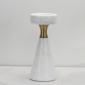 Front view of the tall sculptural white marble candle holder with brass neck