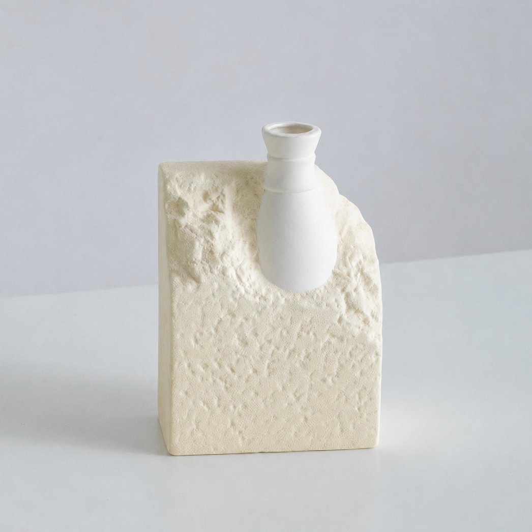 Short beige textured ceramic decorative flower vase