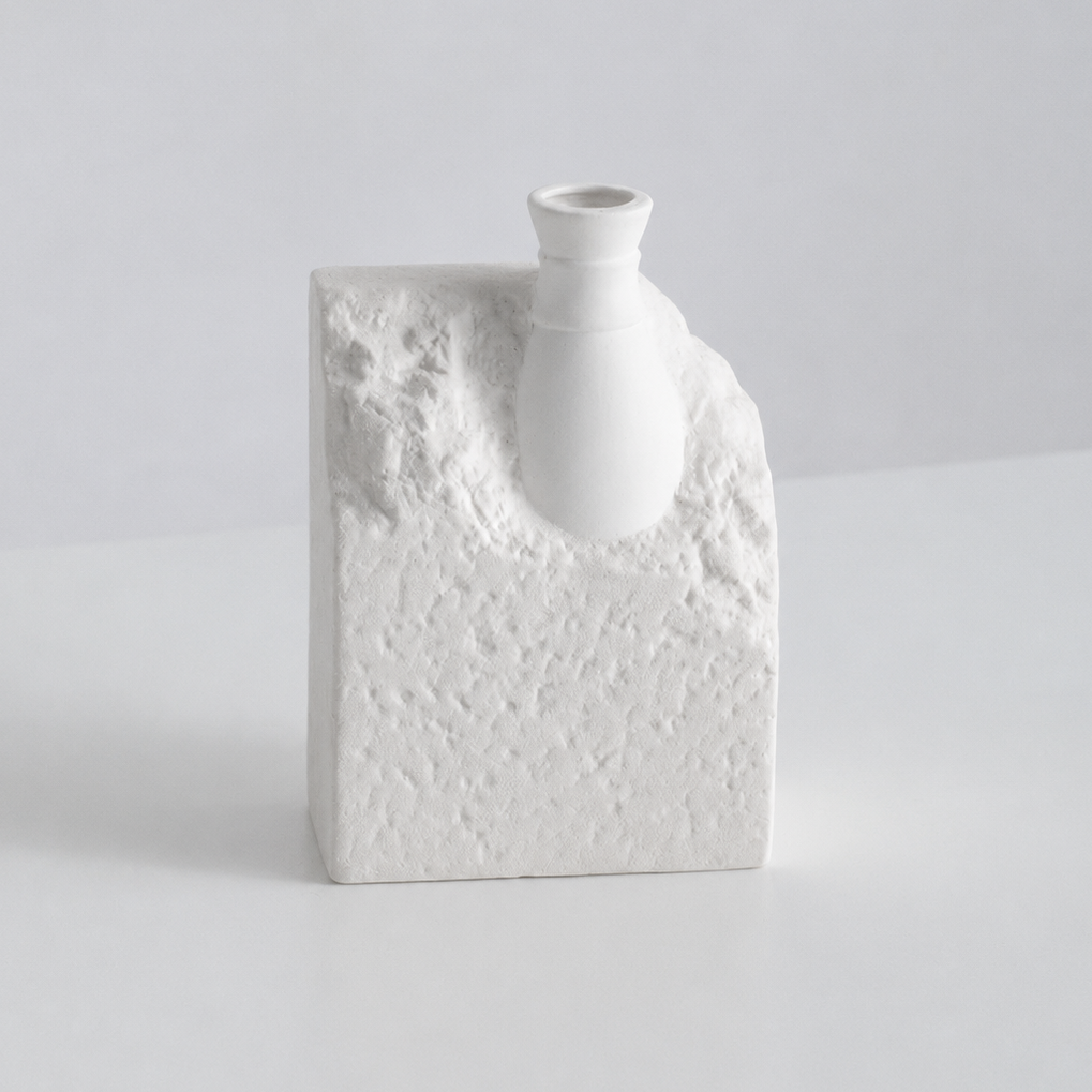 Short white textured ceramic decorative flower vase