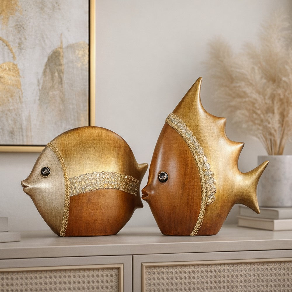 Decorative ceramic fish sculpture set in brown displayed on a console with coastal styling