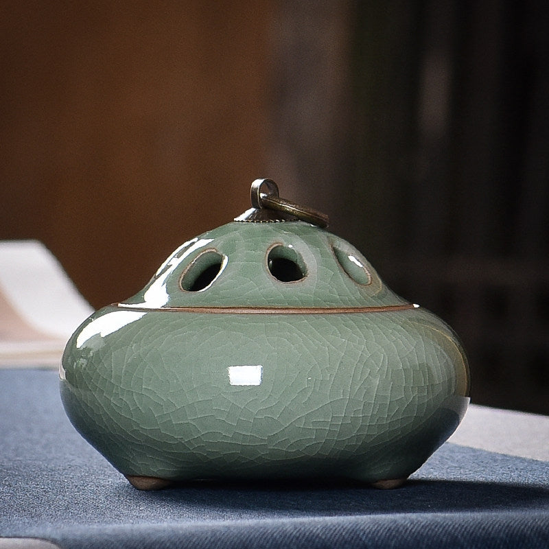 Sage Green ceramic incense burner with crackle glaze and ventilated lid