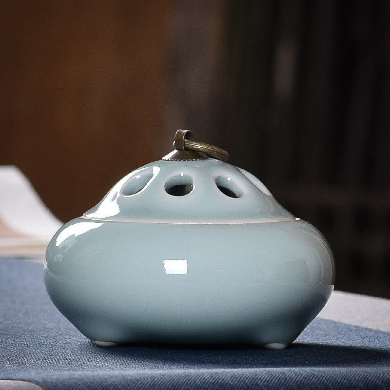 Pale Blue ceramic incense burner with smooth glazed finish and ventilated lid