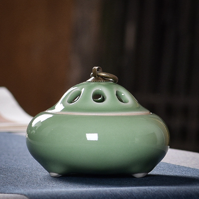 Jade Green ceramic incense burner with glossy glaze and metal ring handle