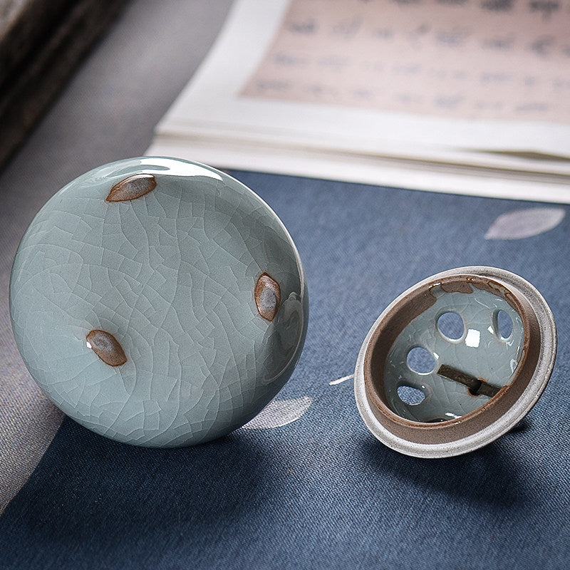 Underside view of Blue Gray ceramic incense burner and removable lid