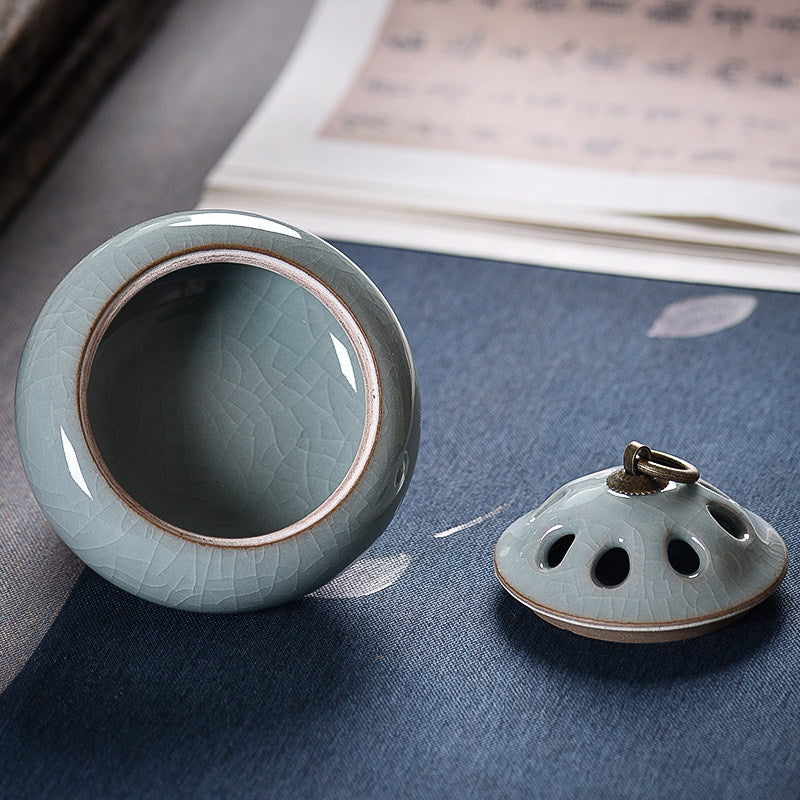 Blue Gray ceramic incense burner showing base and removable vented lid