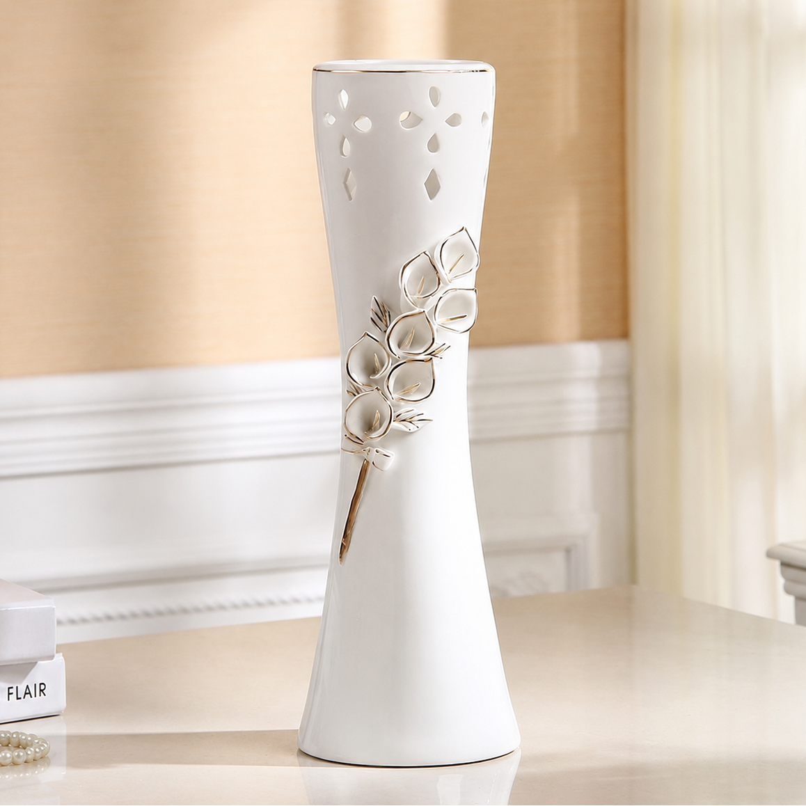 Large white flower ceramic vase with raised floral relief and elegant cutout design