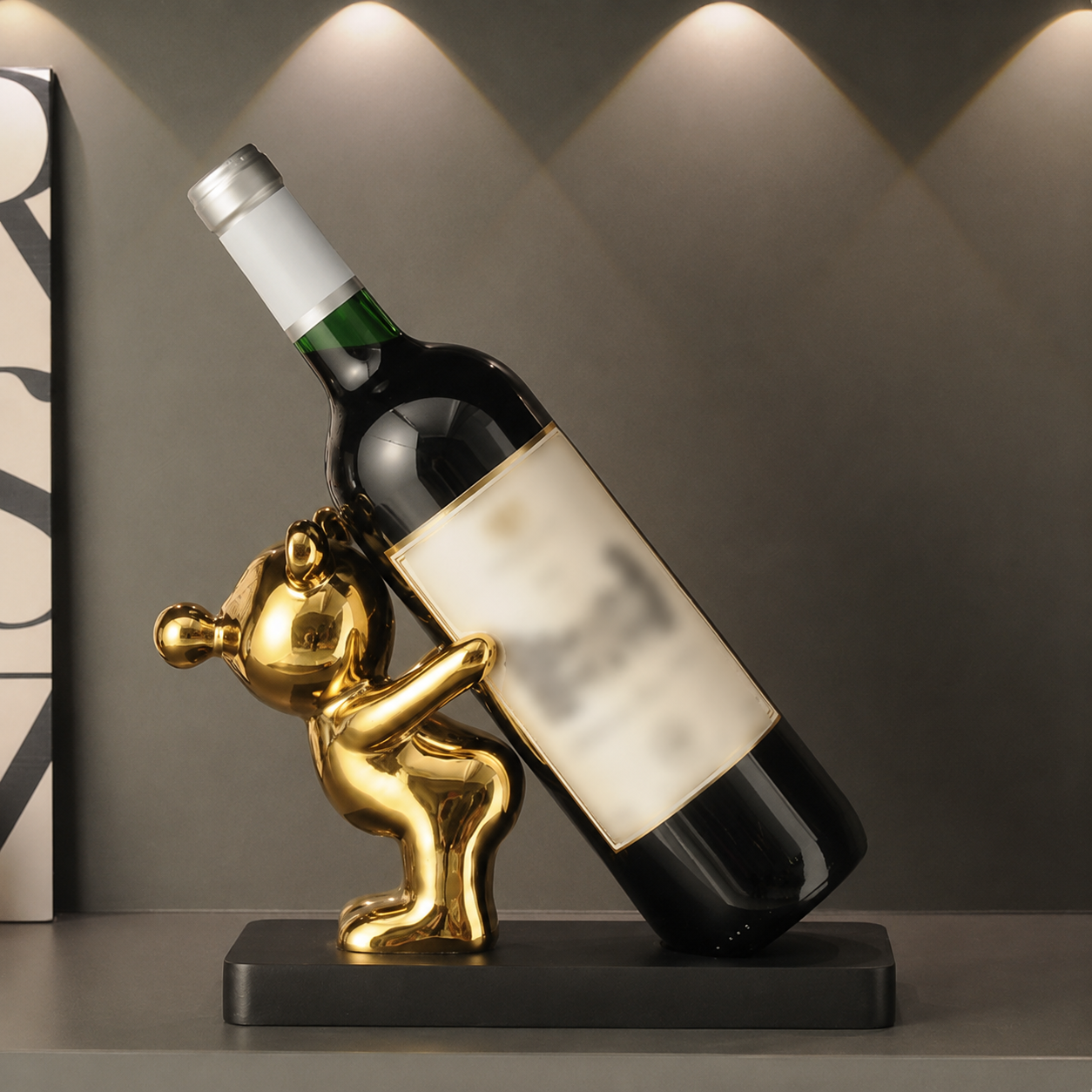 Gold bear ceramic wine bottle holder with wine bottle on black wood base