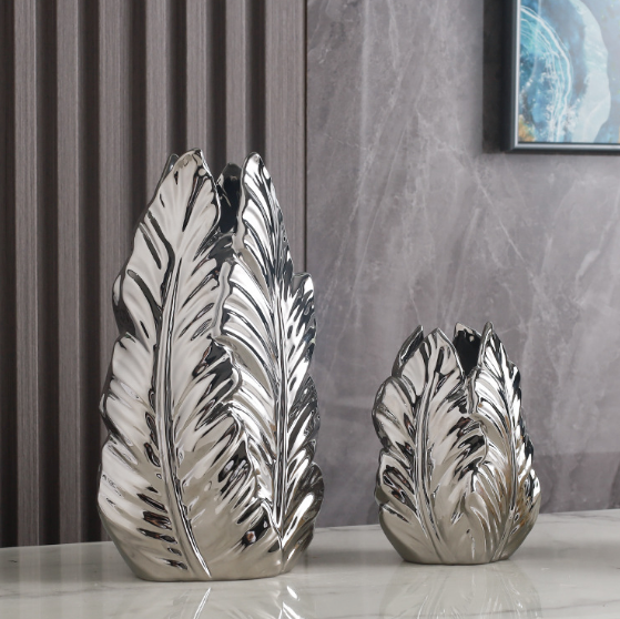 Silver electroplated plantain leaf vase set displayed on a modern tabletop