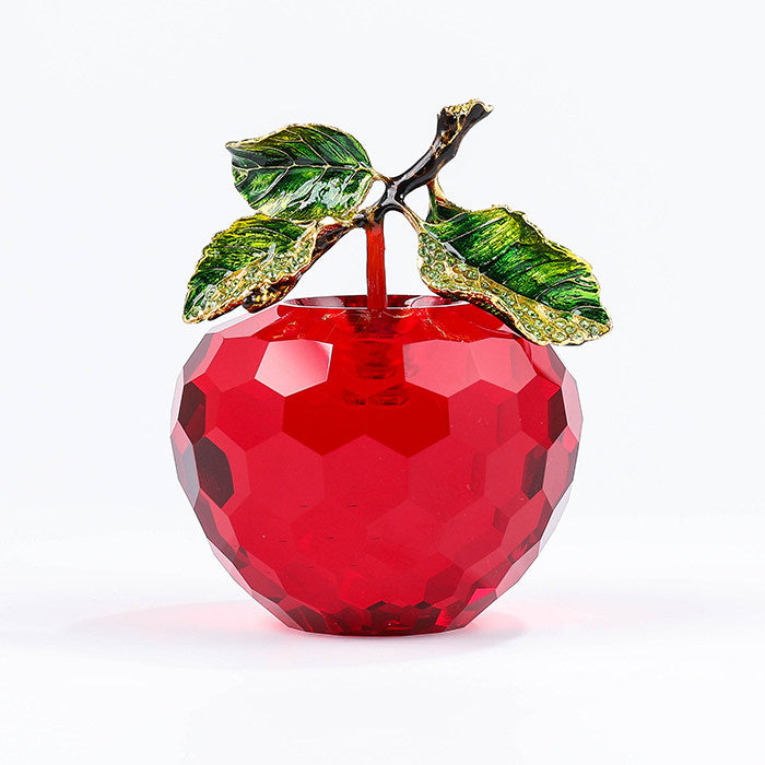 Red faceted crystal apple decor with green enamel leaves and polished crystal finish