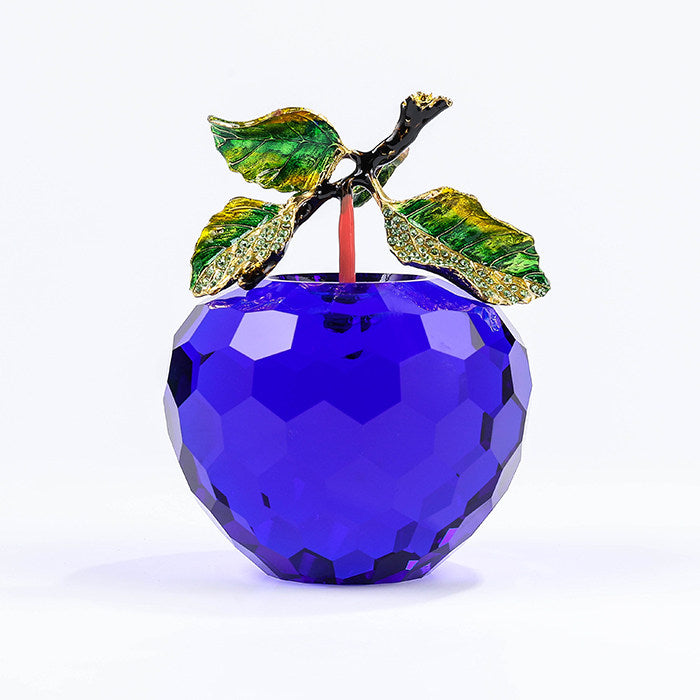 Blue faceted crystal apple decor with green enamel leaves and gold-tone accents