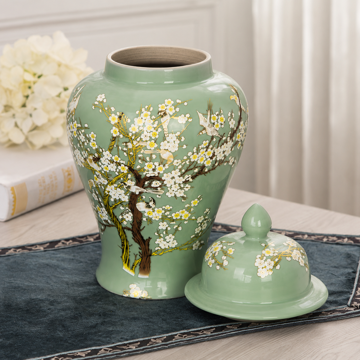 Green floral bird ceramic ginger jar vase with lid shown open beside its matching lid