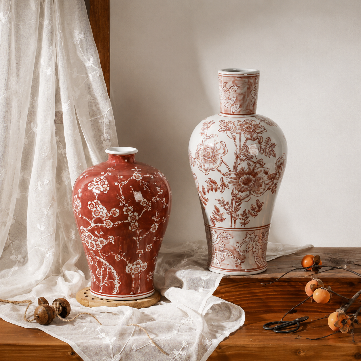 Red plum blossom vase and tall brown floral ceramic vase styled together