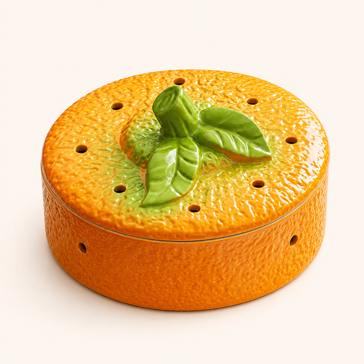 Persimmon ceramic incense burner with textured fruit design and green leaf lid for ritual home decor
