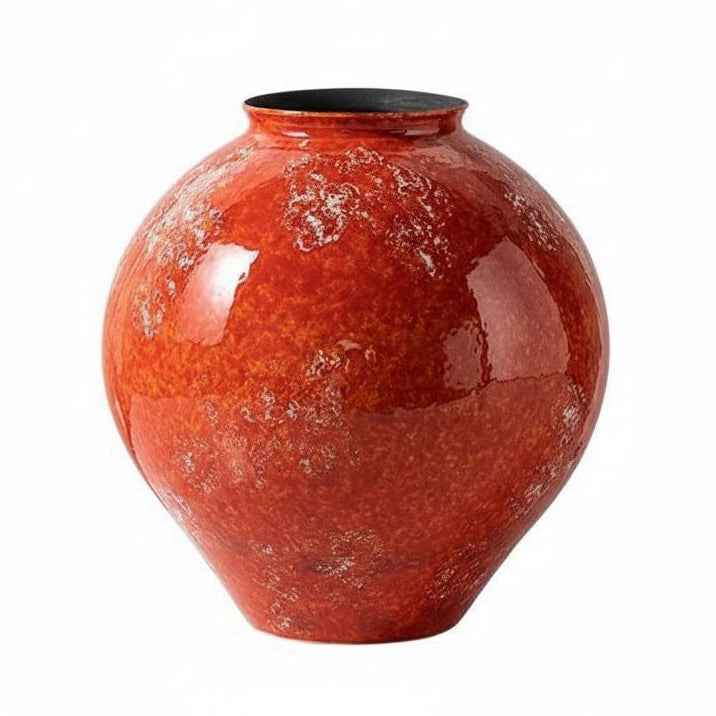 Glossy orange ceramic vase isolated on white background