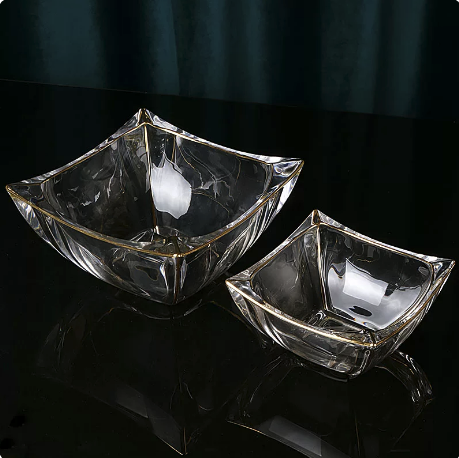 Medium and Large gold rimmed wavy glass bowls displayed together