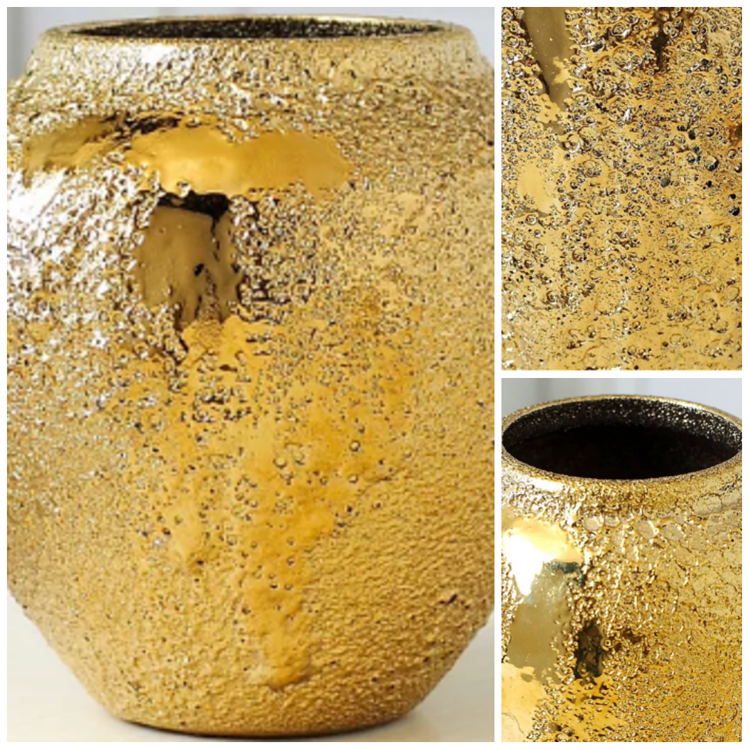 Close up of textured gold tone electroplated ceramic vase finish and rim