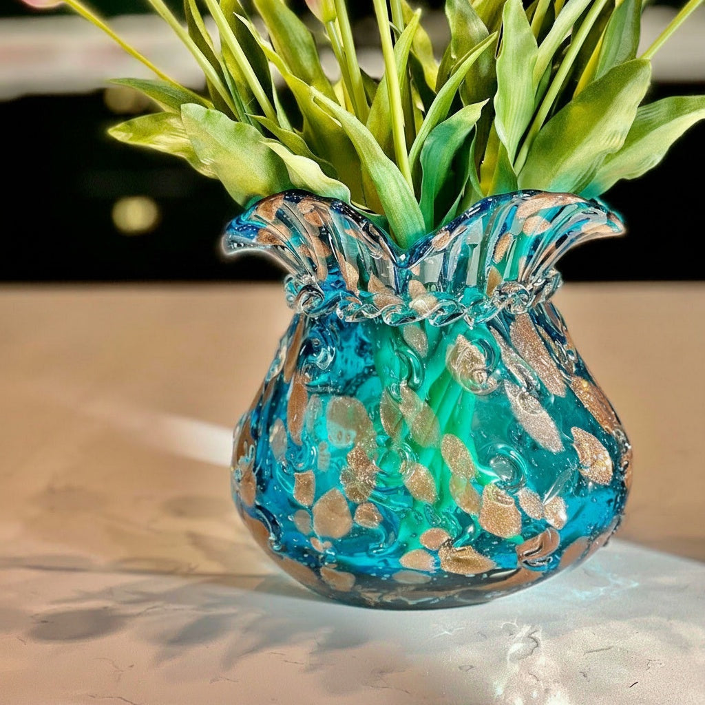Blue hand blown art glass vase with gold flecks and green stems