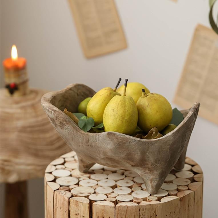 Rustic footed wood centerpiece bowl styled with pears and candlelight
