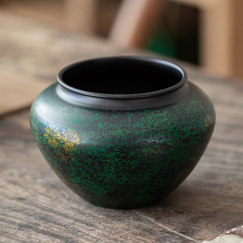 Deep Teal handcrafted iron tea ritual bowl with gold detailing on a rustic tabletop