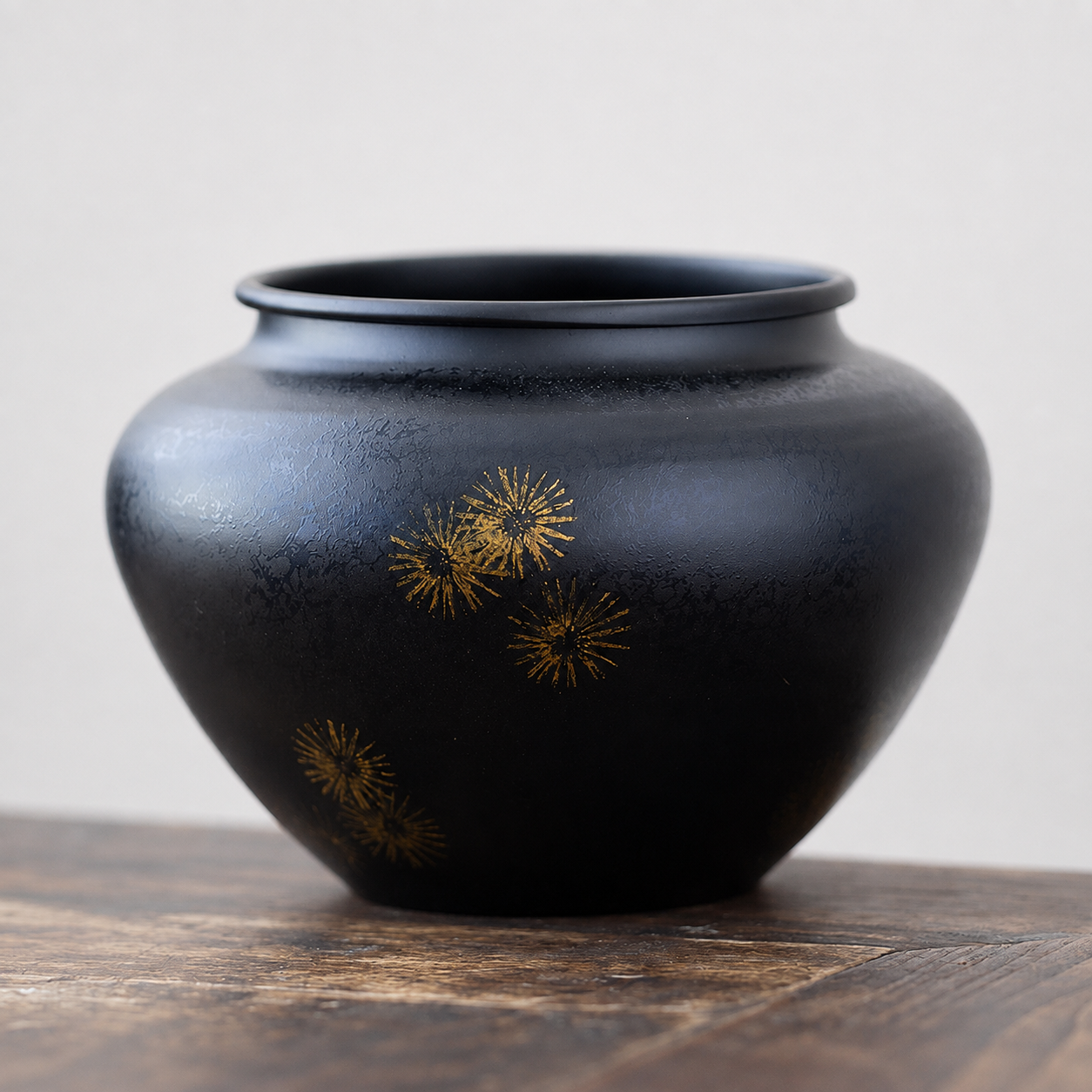 Deep Plum handcrafted iron tea ritual bowl with subtle gold starburst decoration