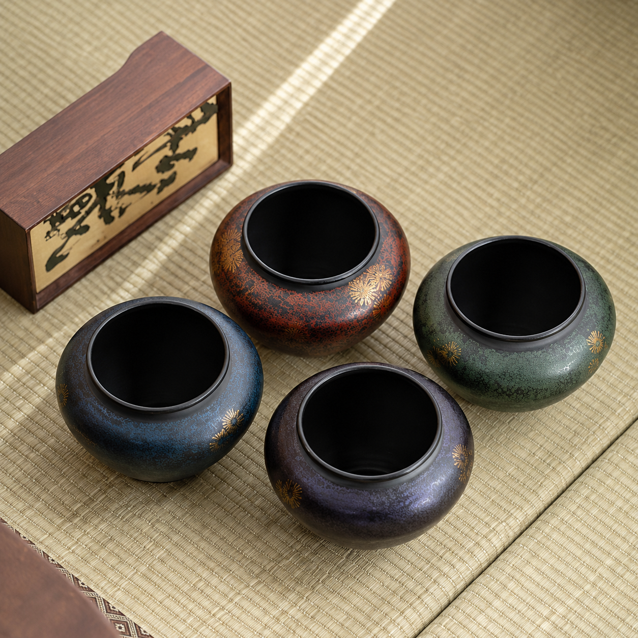 Four handcrafted iron tea ritual bowls in Deep Teal Midnight Blue Burnished Maroon and Deep Plum