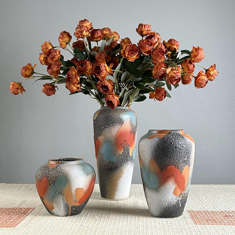 Handmade abstract glaze ceramic vases in three sizes with orange and blue textured finish