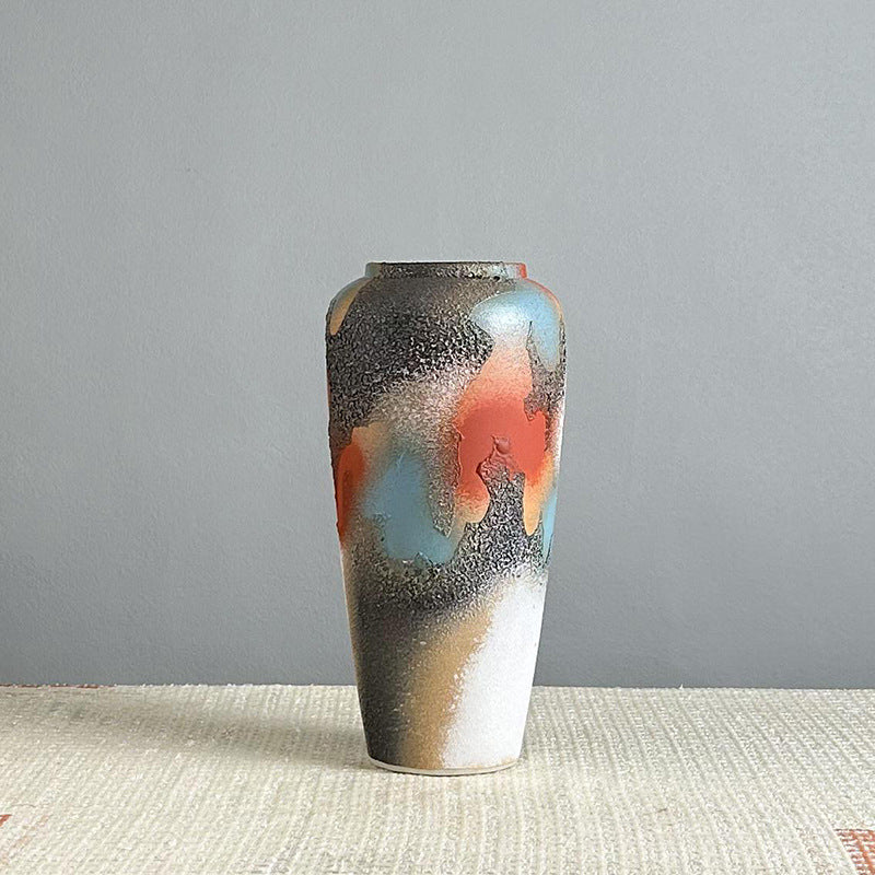 Large handmade abstract glaze ceramic vase with tall sculptural shape and textured glaze