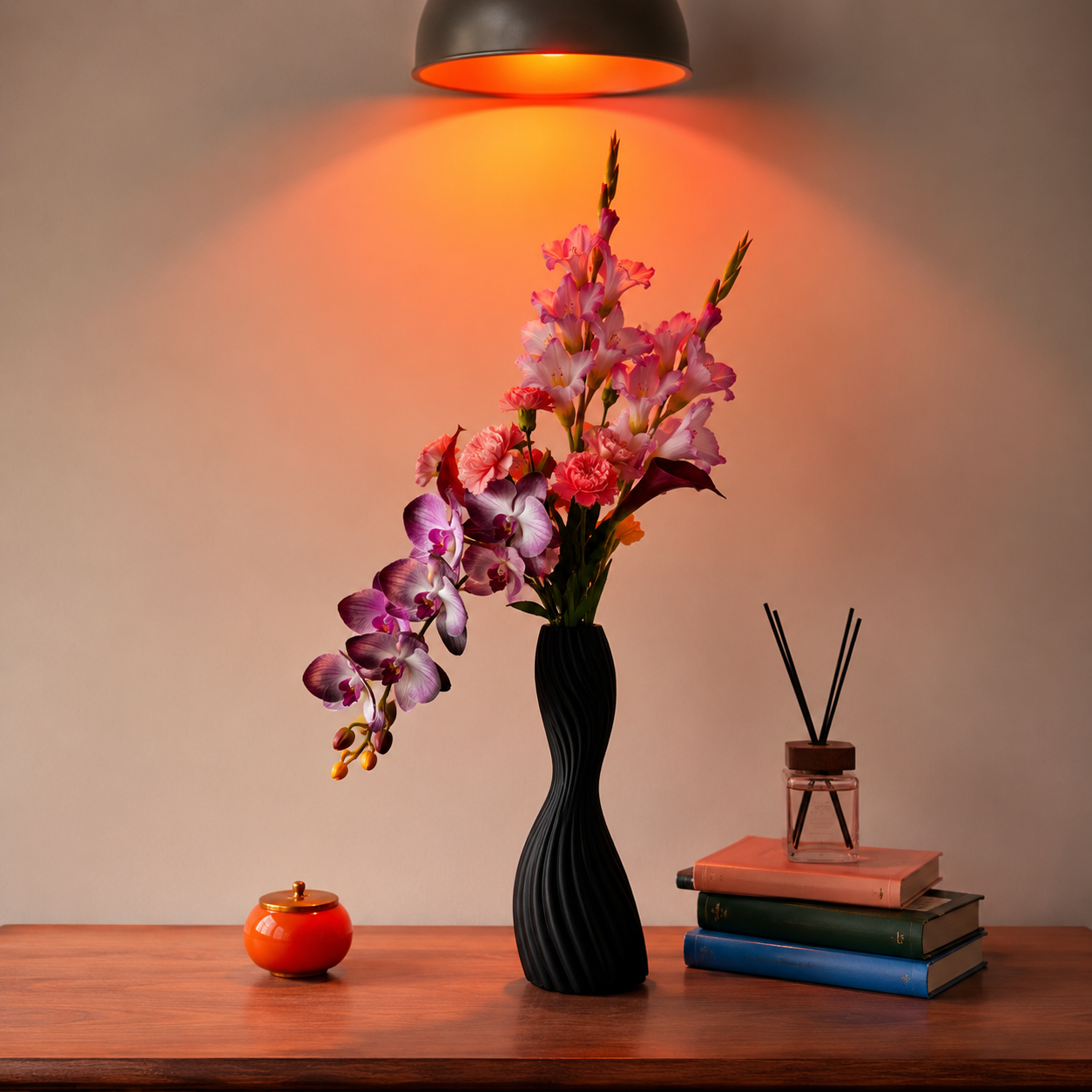 Black ribbed ceramic twist vase with colorful floral arrangement on console table in warm ambient light