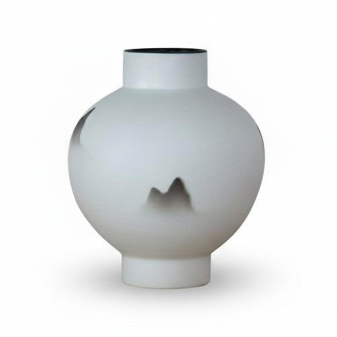 Large white ceramic round mountain vase on a clean white background