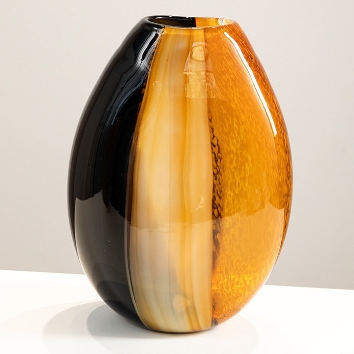 Large amber and black hand blown glass vase with organic textured pattern