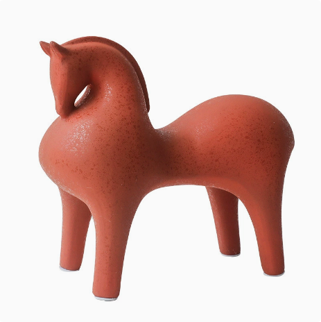 Terracotta red modern ceramic horse sculpture on white background