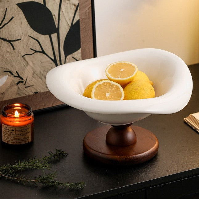 Modern ceramic centerpiece bowl with lemon display and solid wood pedestal base