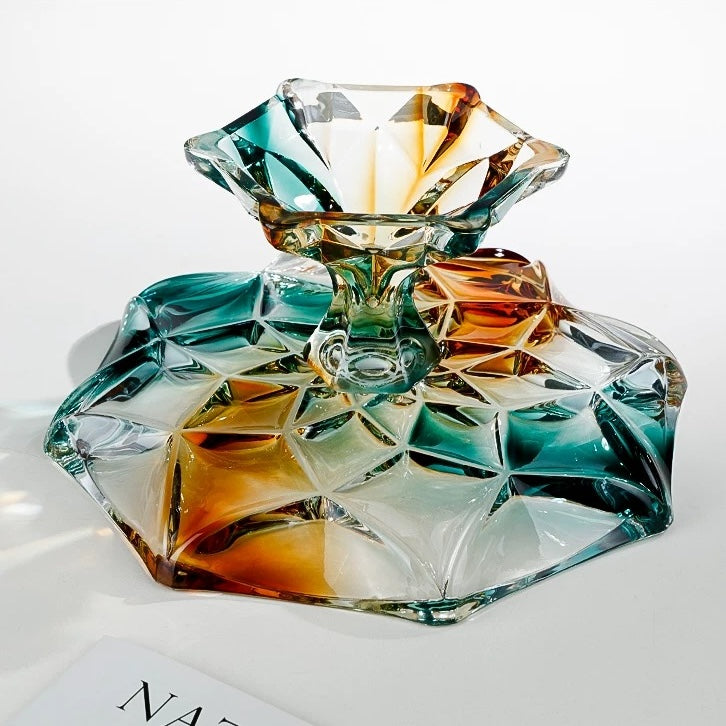 Bottom view of geometric glass pedestal centerpiece bowl showing sculptural faceted base