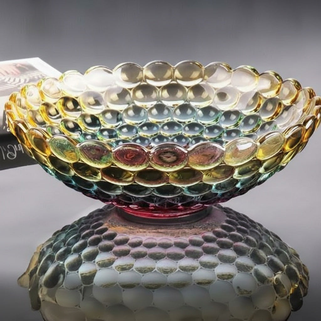 Iridescent textured bubble glass centerpiece bowl displayed on reflective tabletop