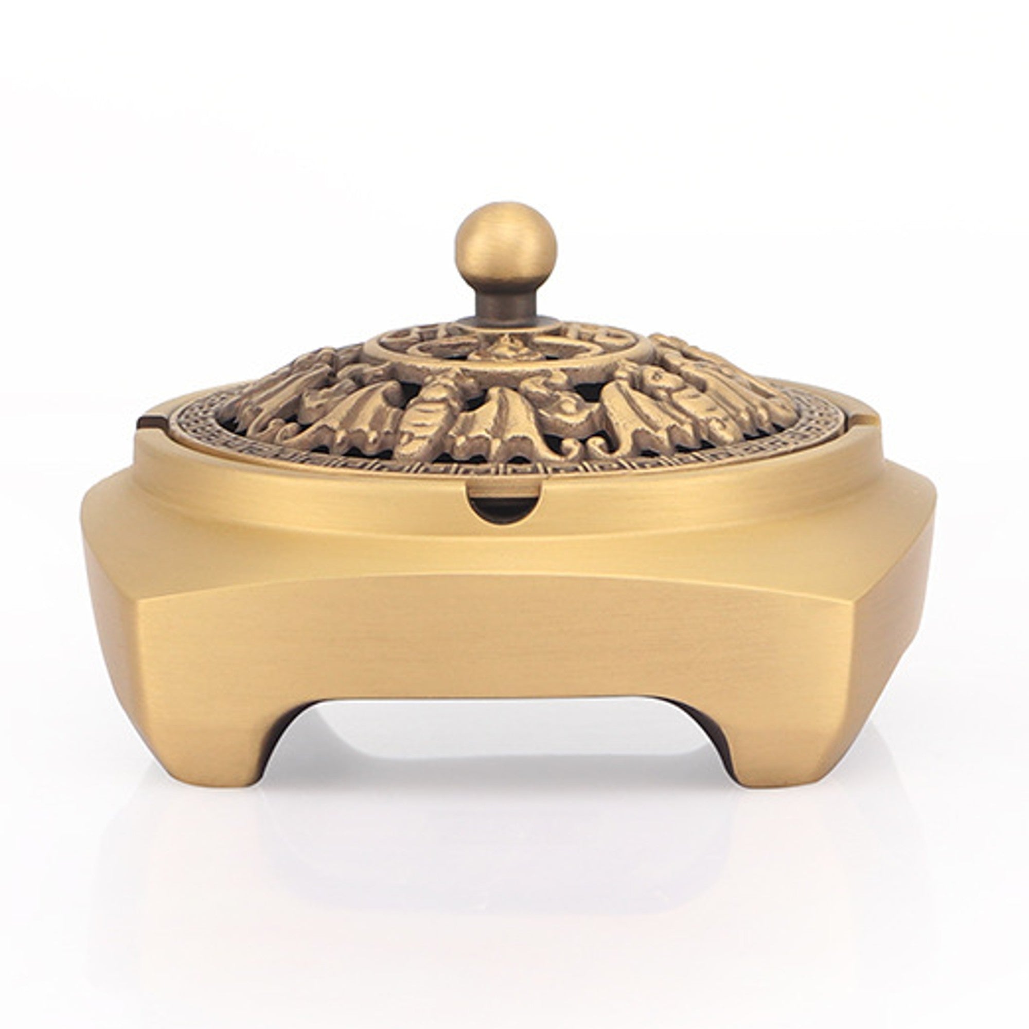 Ornate brass incense burner with lid and gold-tone finish on white background