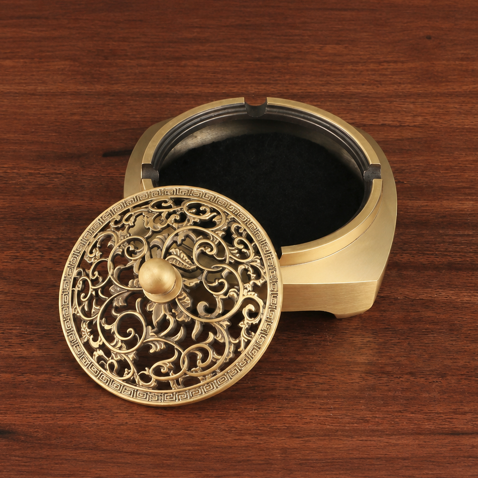 Gold-tone brass incense holder with removable lid and black inner tray