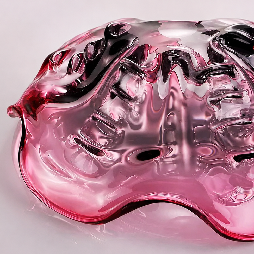 Close up underside view of plum ruffled art glass centerpiece bowl