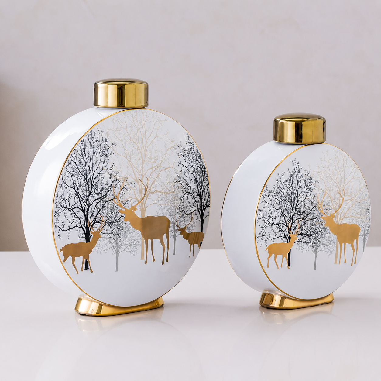 Winter Deer ceramic vase set in medium and large sizes with gold cap and base