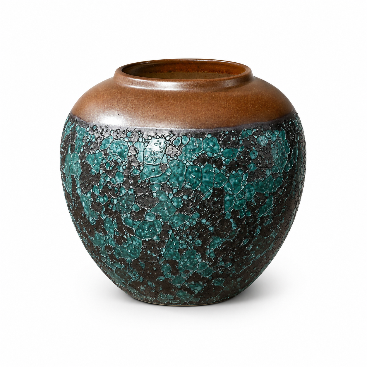 Turquoise and bronze textured round ceramic vase on white background