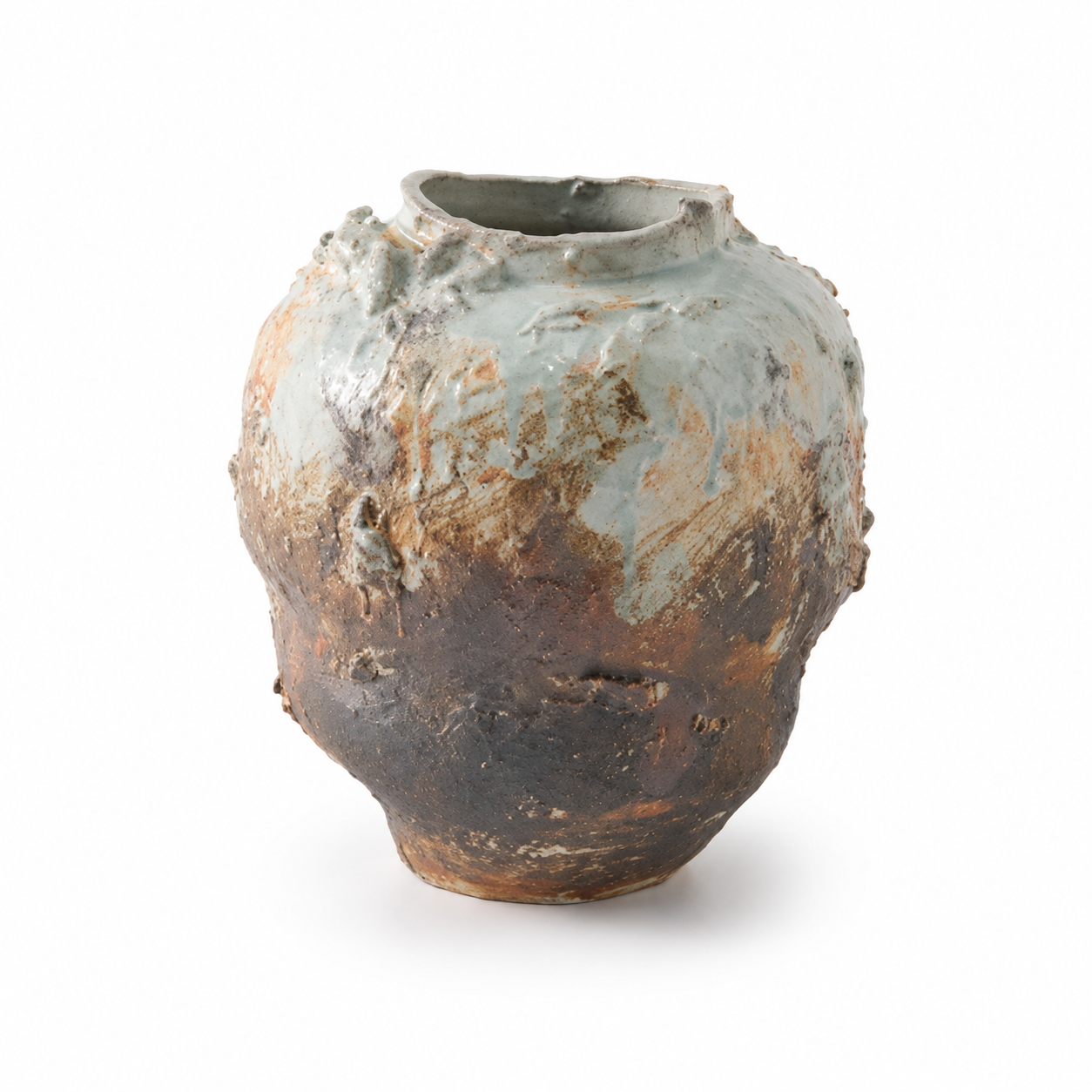 Medium rustic textured ceramic vase with organic handmade-style glaze on white background