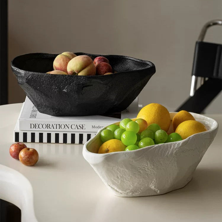 Black and white textured ceramic centerpiece bowls styled together with fruit