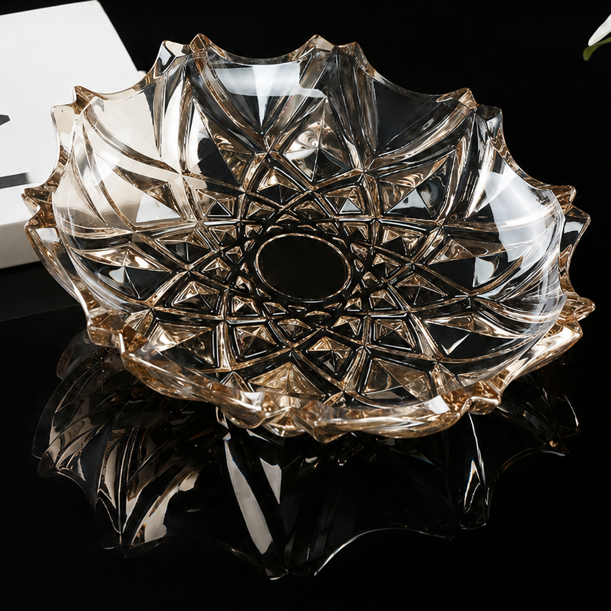 Close view of smoky faceted glass bowl underside on reflective black surface