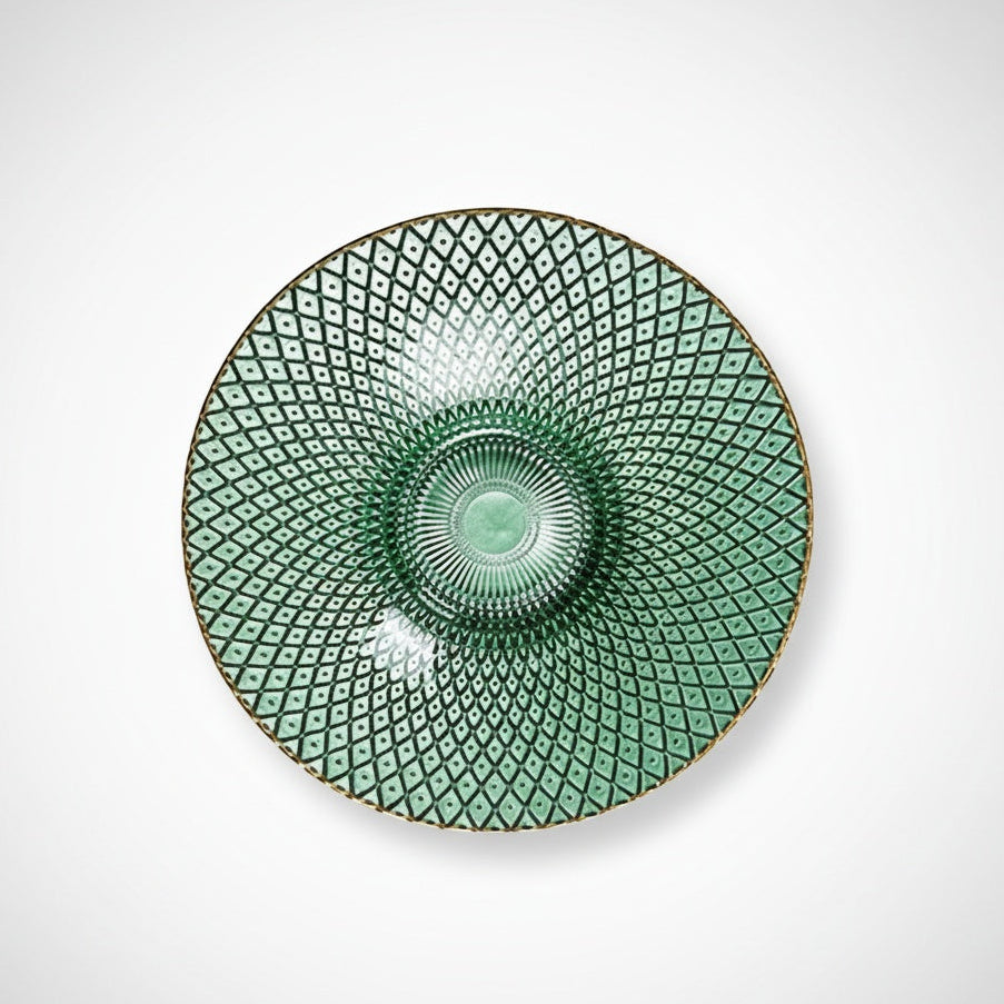 Top view of green round ribbed glass centerpiece bowl with gold rim