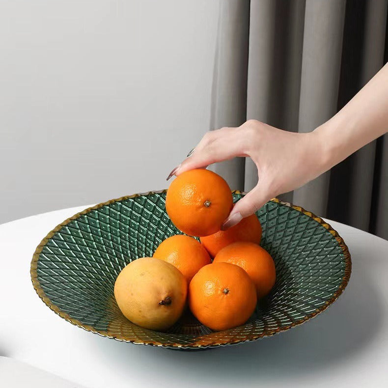 Green flared glass gold rim centerpiece bowl styled with oranges