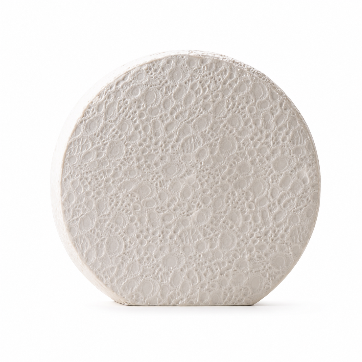 Large textured white ceramic round vase on a white background