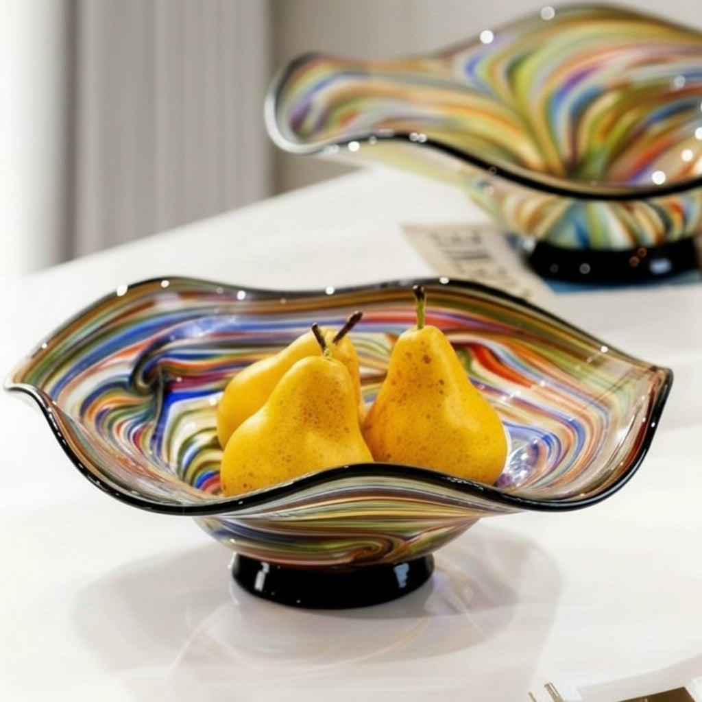 Multicolor wavy art glass centerpiece bowl with pears styled on modern dining table