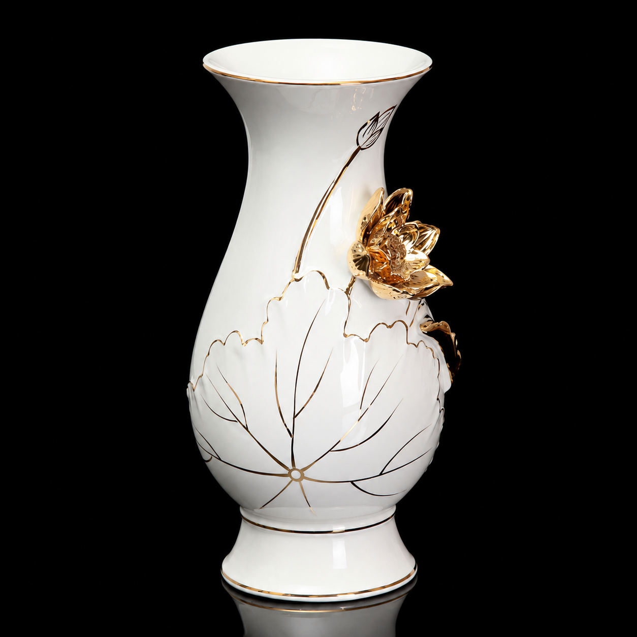 Angled view of white ceramic vase with raised gold lotus flower and glossy gold accents