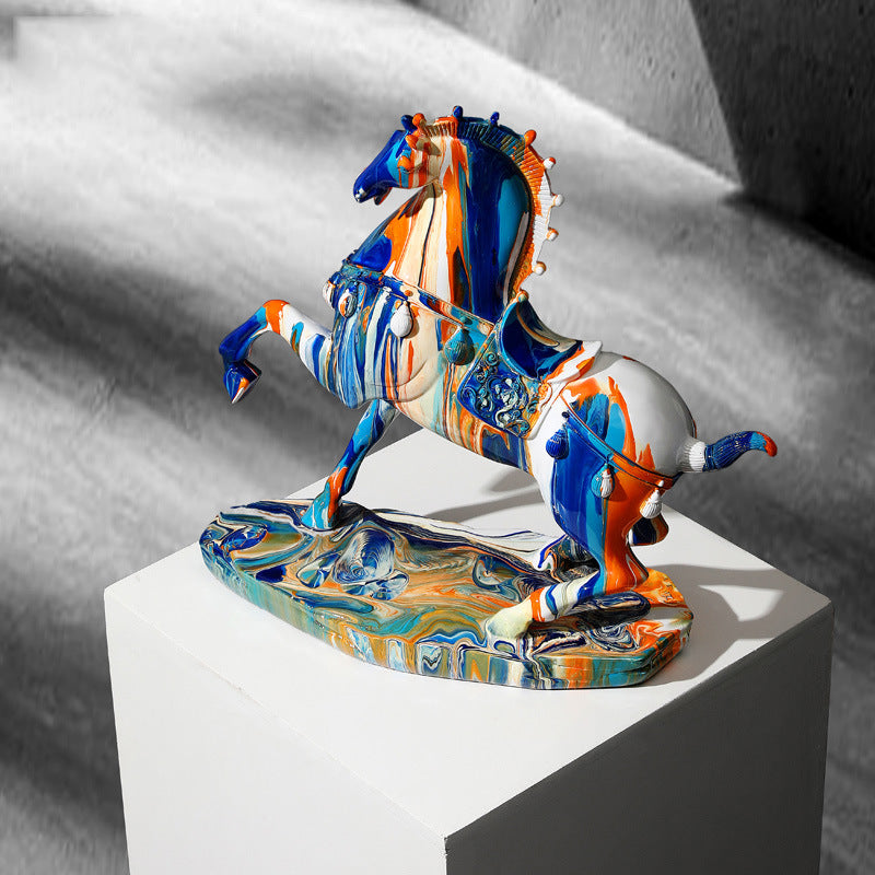 Angled view of colorful ceramic stallion sculpture