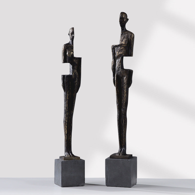 Front view of large and medium abstract resin sculptures